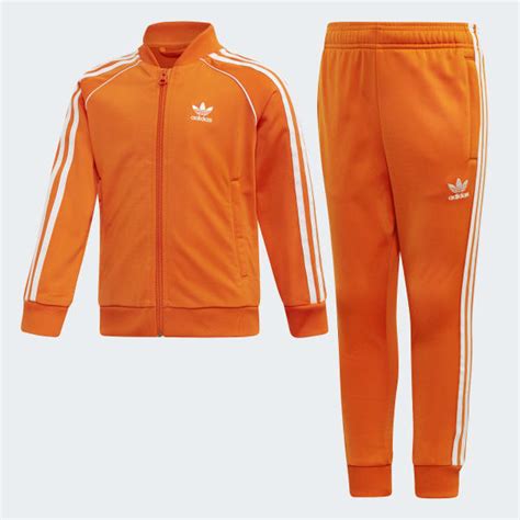 adidas trainingsanzug damen schwarz orange|Orange .